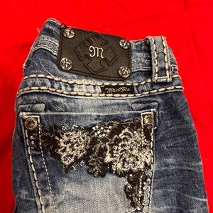 Miss Me Distressed Blue Jeans with Black Embellishments